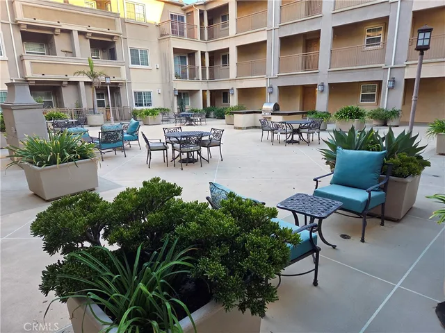 a view of parking garage with cars