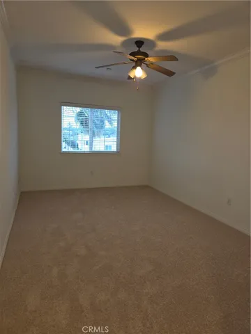 a bathroom with a toilet sink and shower