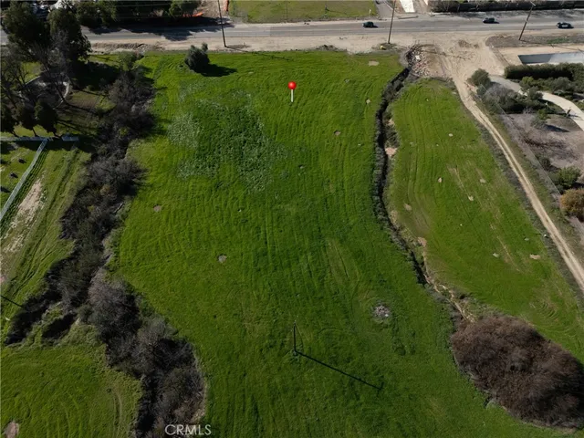 a view of a garden with a lake