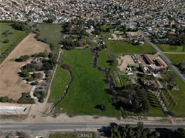 an aerial view of a house with a lake view