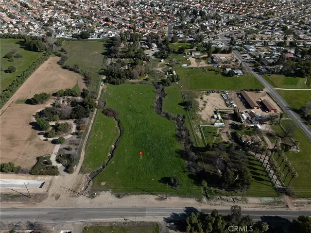 an aerial view of a house with a lake view