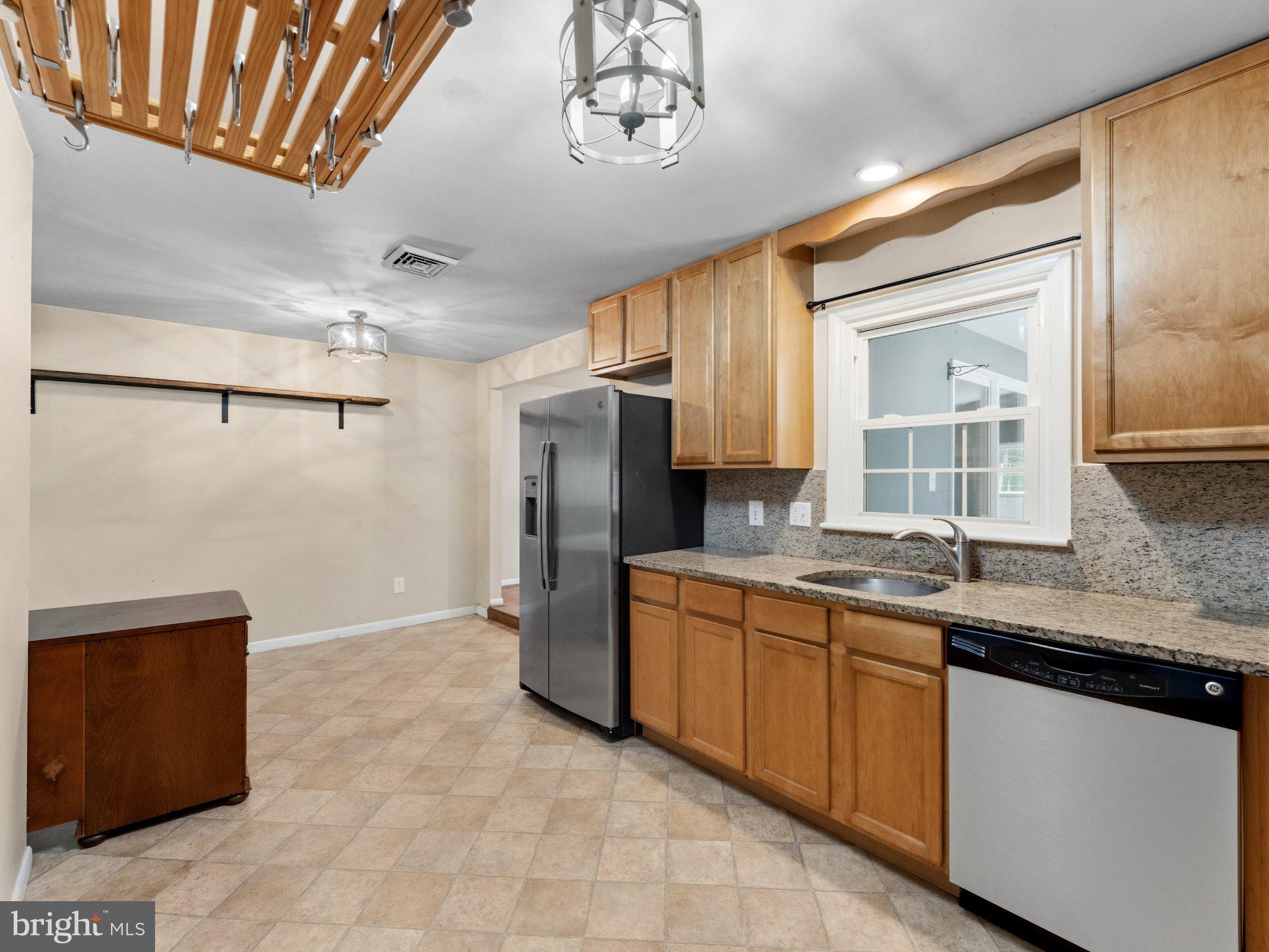 34 Supawna Road Pennsville, NJ 08070 - Photo 12 of 28 Modern kitchen with warm wood accents.
