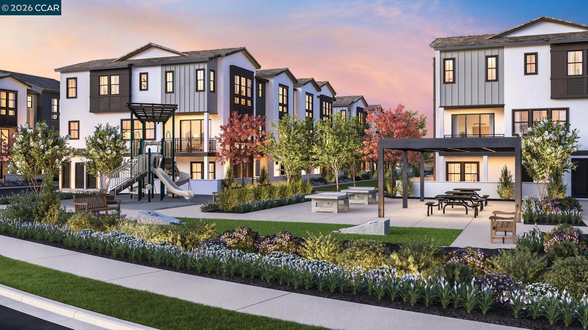 19629 Juniper Loop Morgan Hill, CA 95037 - Photo 8 of 13 a front view of a house with a yard and lake view