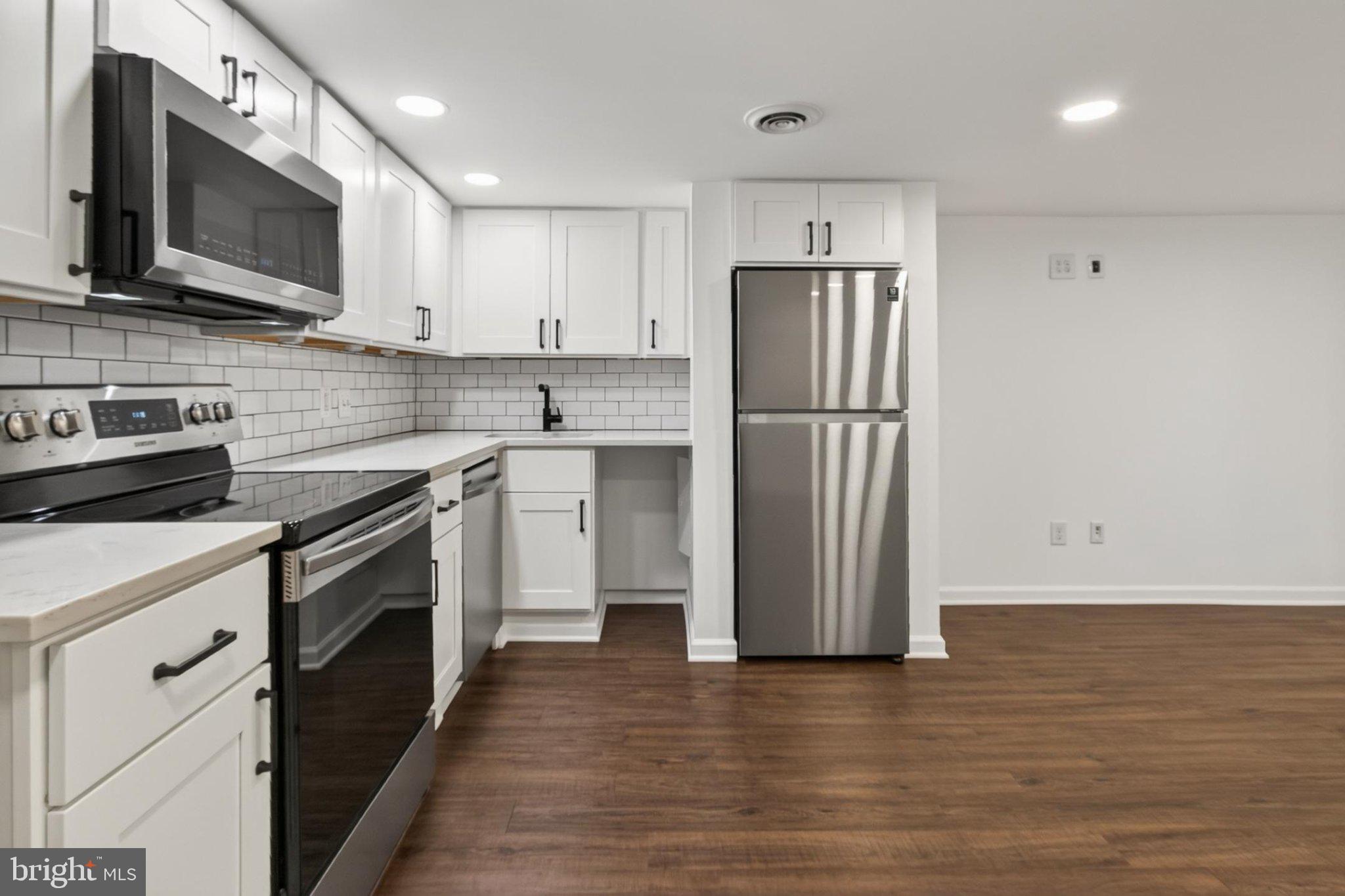 738 11th Street Northeast, Unit 3 Washington, DC 20002 - Photo 14 of 29 Modern kitchen with sleek finishes.