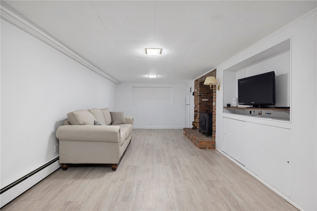 331 3rd Beach Road Middletown, RI 02842 - Photo 43 of 50 Separate zone lower level- woodstove