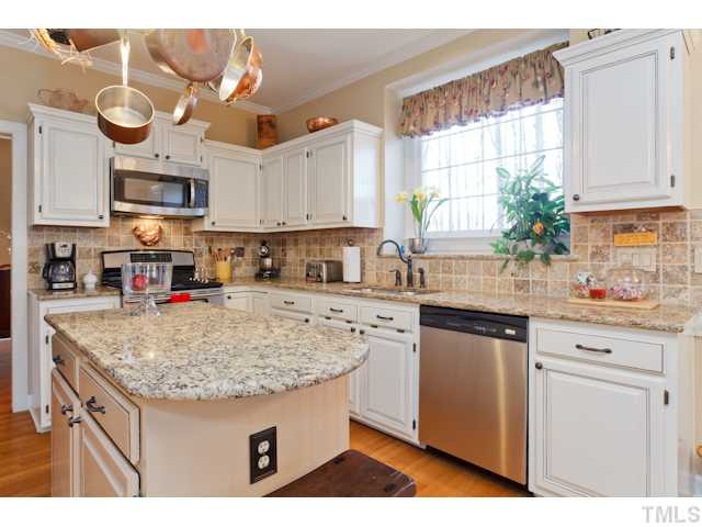 Loads of Cabinet Space with Custom Paint & Crown Moldings! Kitchen
