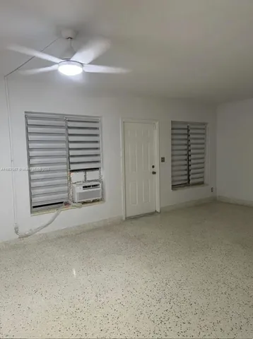 a utility room with cabinets