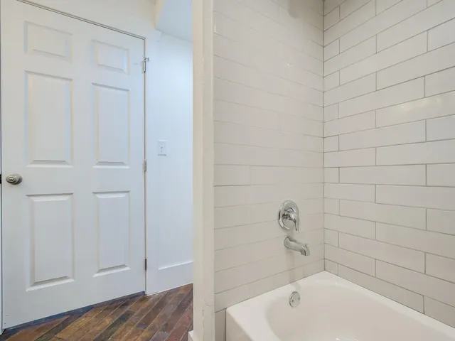 a bathroom with a bathtub