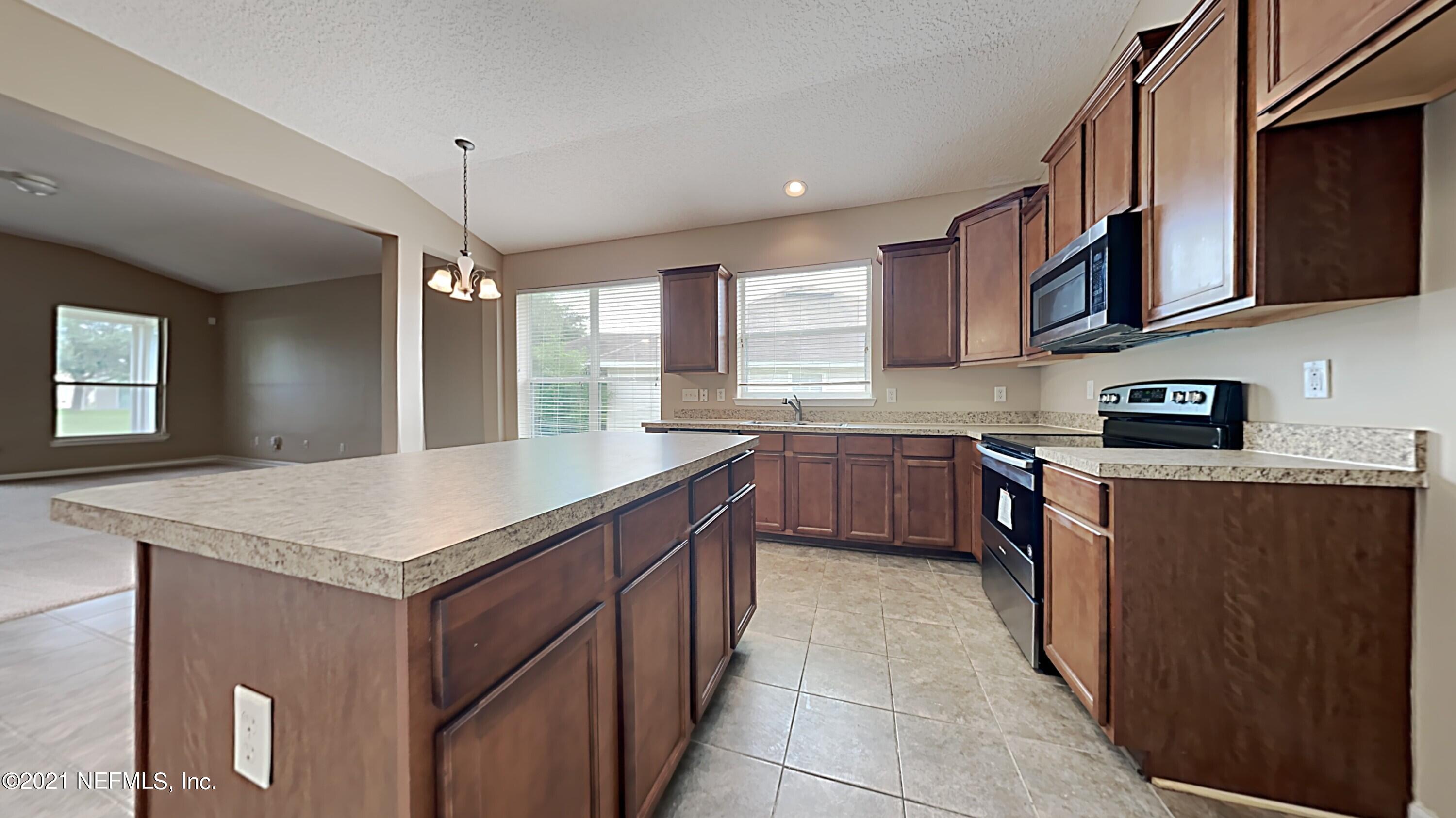 5889 Round Table Road Jacksonville, FL 32254 - Photo 8 of 22 7_Image_JrWF9VQqiV