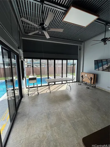 a view of an empty room with a balcony