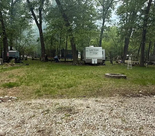 a view of a house with a back yard