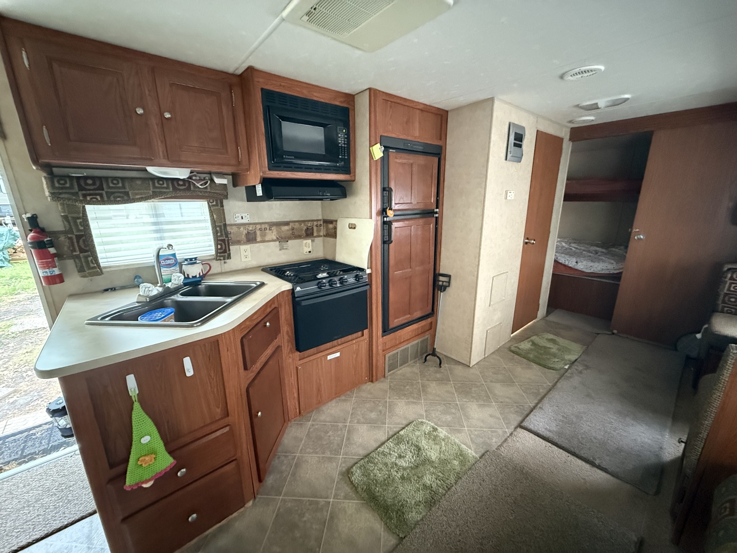 21-191 Woodhaven Lakes Sublette, IL 61367 - Photo 6 of 22 a kitchen with stainless steel appliances granite countertop a refrigerator a stove top oven a sink and dishwasher