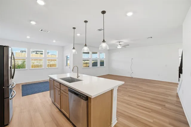 a view of a bench in front of a house