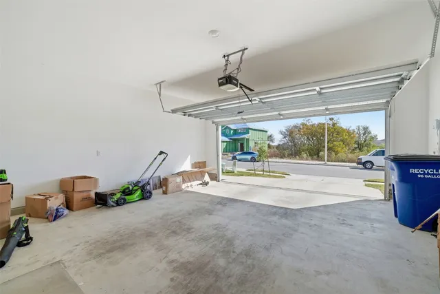 a bathroom with a sink a toilet a mirror a bathtub and shower