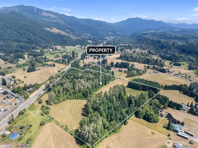 a view of a street with a park