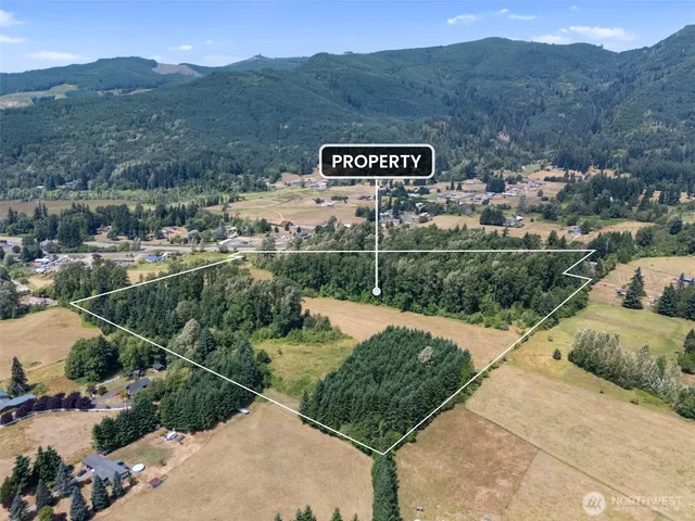 a view of a lake in middle of the town