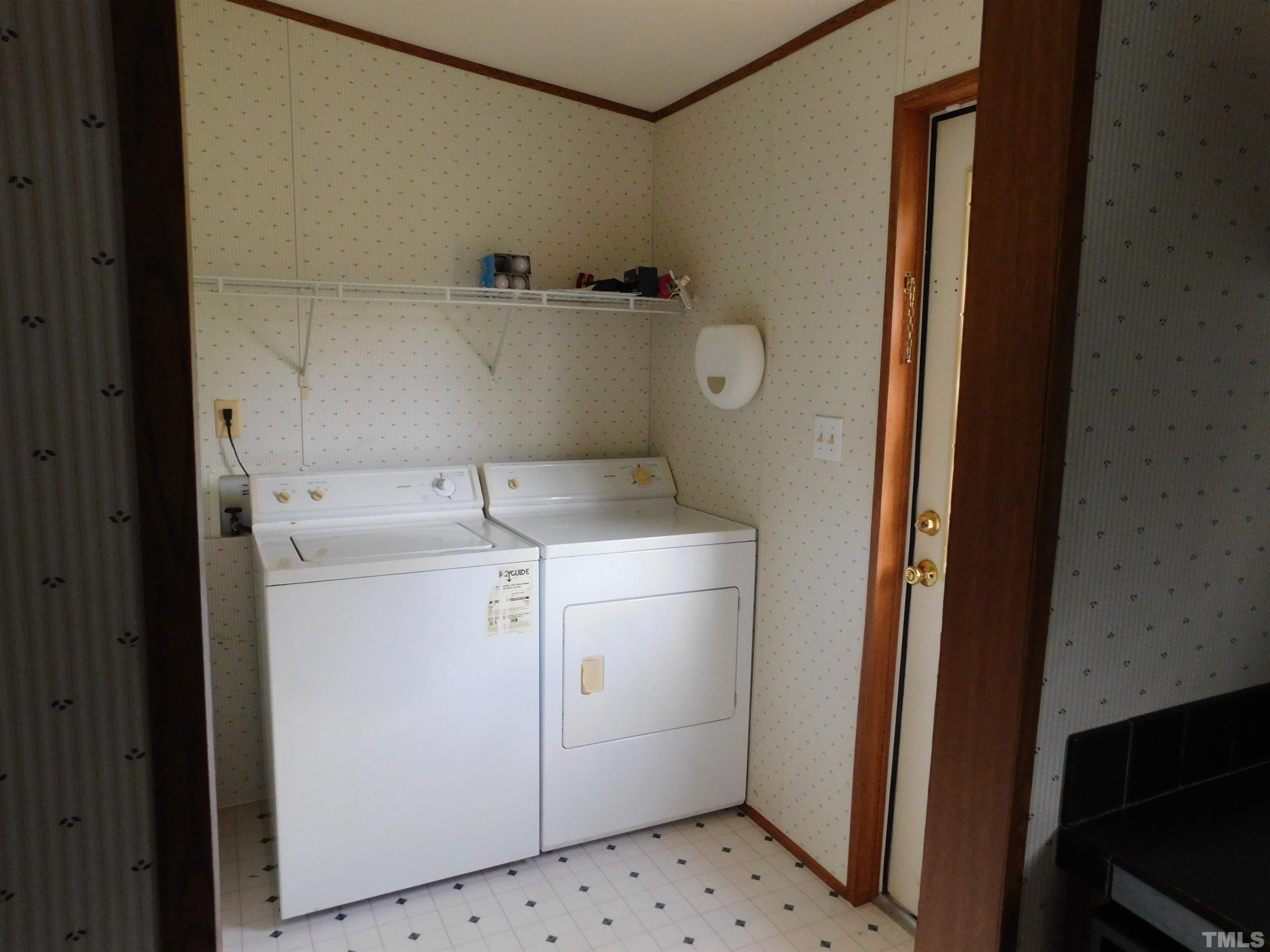 45 Ray-Denton Road Spring Hope, NC 27882 - Photo 11 of 13 a utility room with dryer and washer