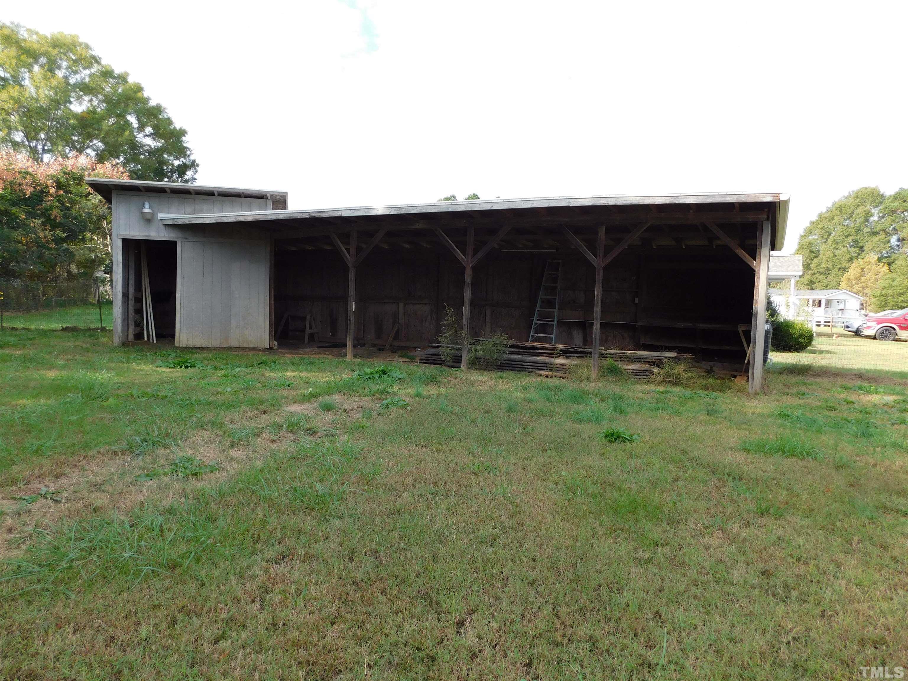 45 Ray-Denton Road Spring Hope, NC 27882 - Photo 12 of 13 a backyard of house with garage