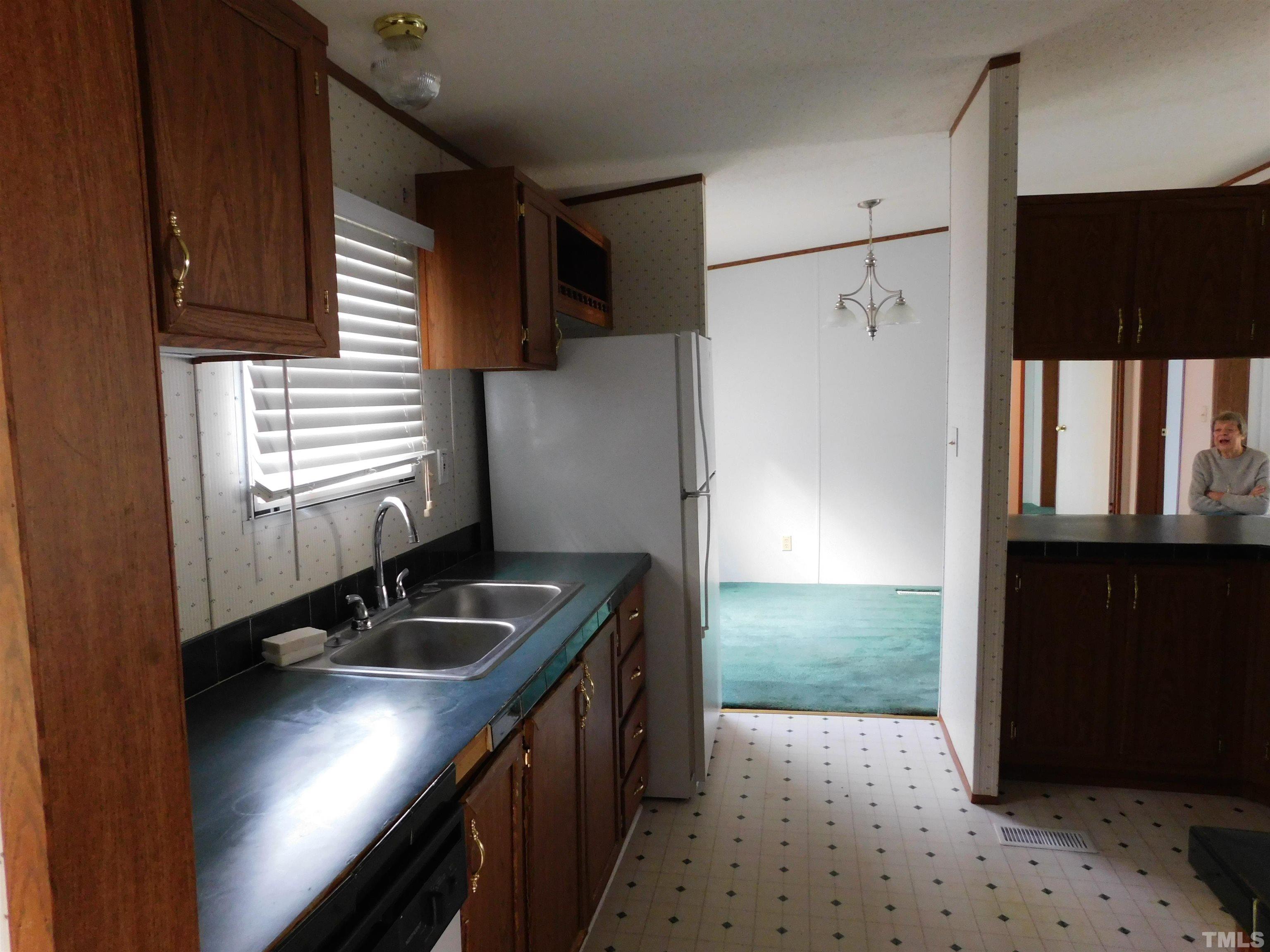45 Ray-Denton Road Spring Hope, NC 27882 - Photo 4 of 13 a kitchen that has a sink and a stove