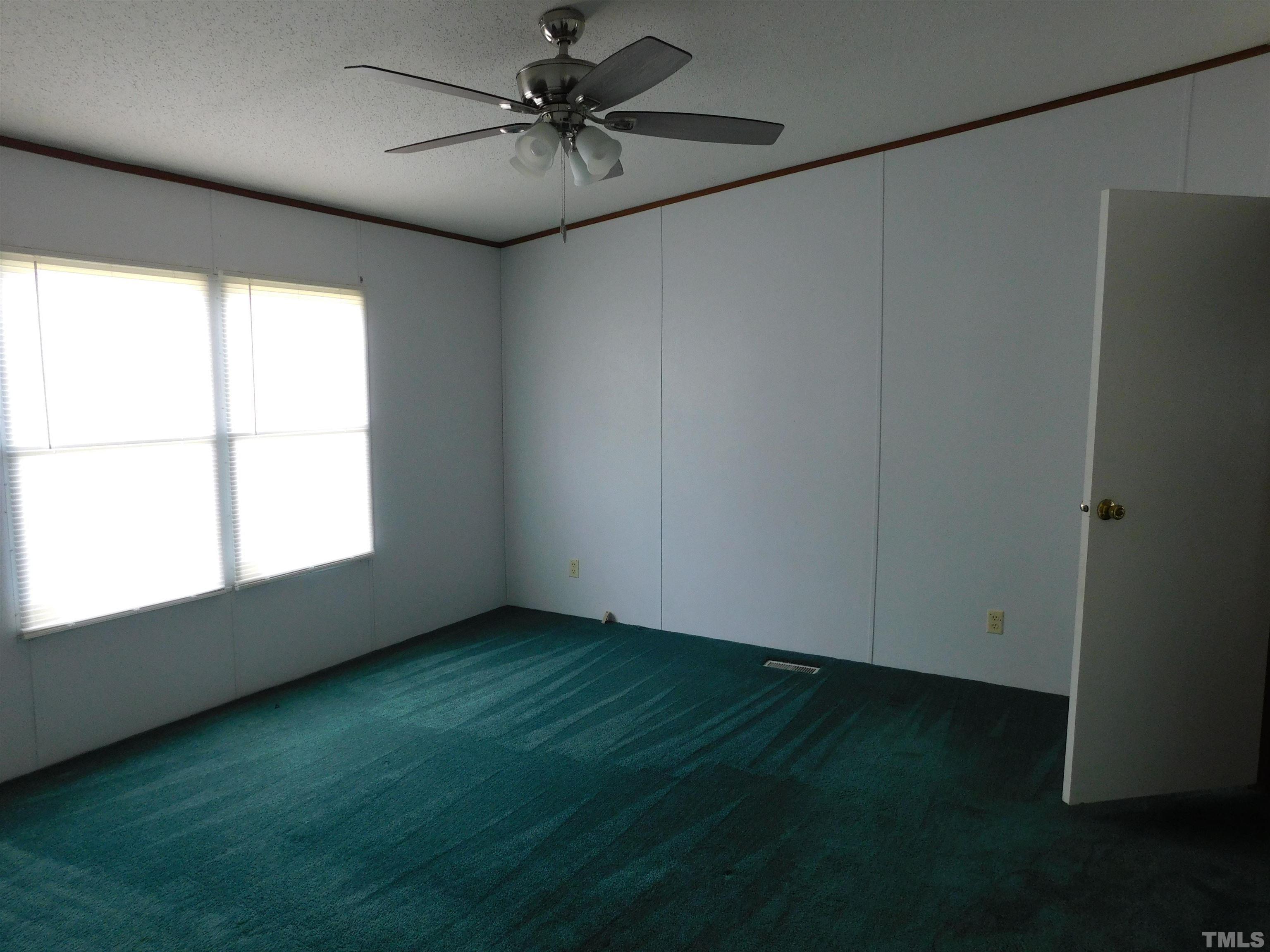 45 Ray-Denton Road Spring Hope, NC 27882 - Photo 7 of 13 a view of room with window and ceiling fan