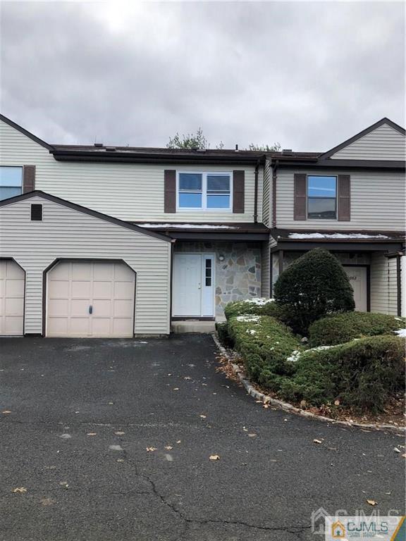 3203 Hana Road Edison, NJ 08817 - Photo 1 of 12 a front view of a house with garage