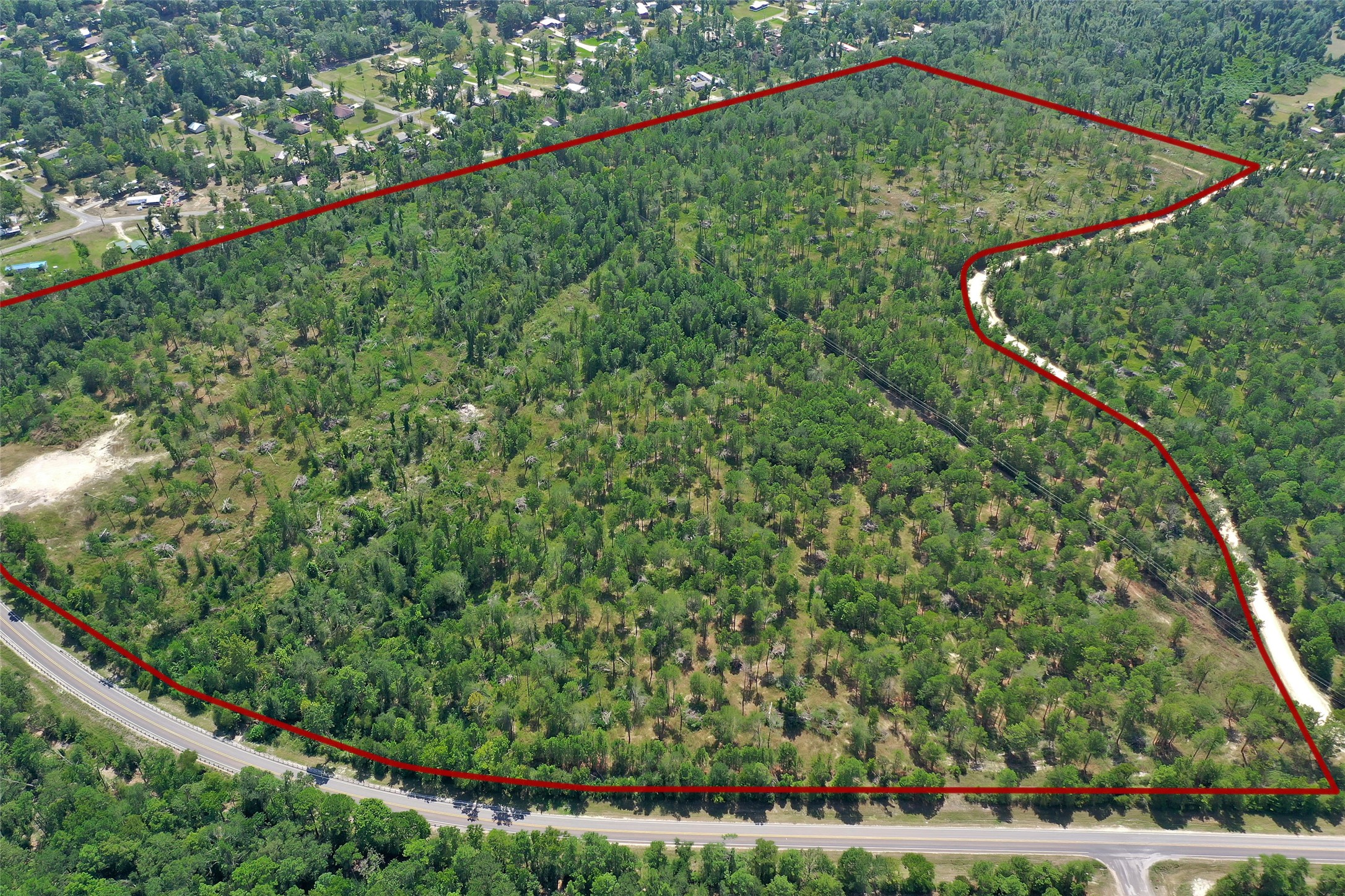 12-1 North Hanson Road Onalaska, TX 77360 - Photo 42 of 44 a backyard of a house with lots of green space