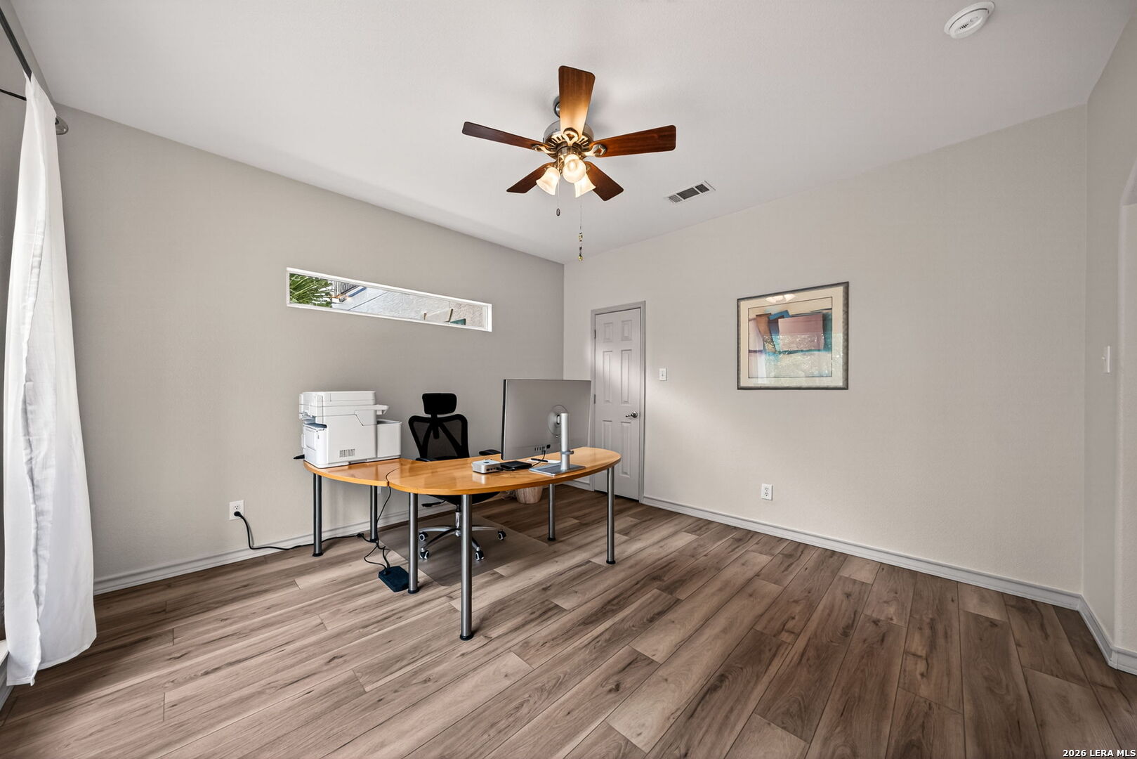 17431 Helotes Spring Road Helotes, TX 78023 - Photo 11 of 50 a work room with furniture and a wooden floor