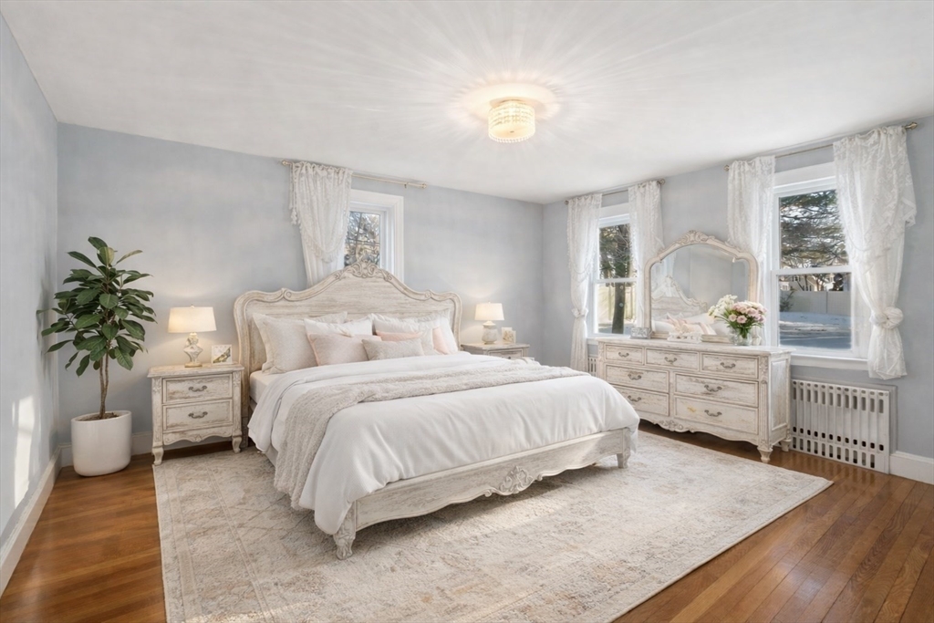 340 North Main Street Natick, MA 01760 - Photo 12 of 35 a bedroom with a bed and a window