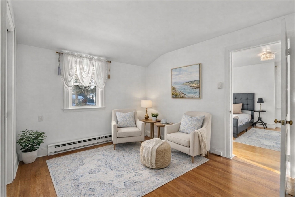 340 North Main Street Natick, MA 01760 - Photo 16 of 35 a living room with furniture and wooden floor