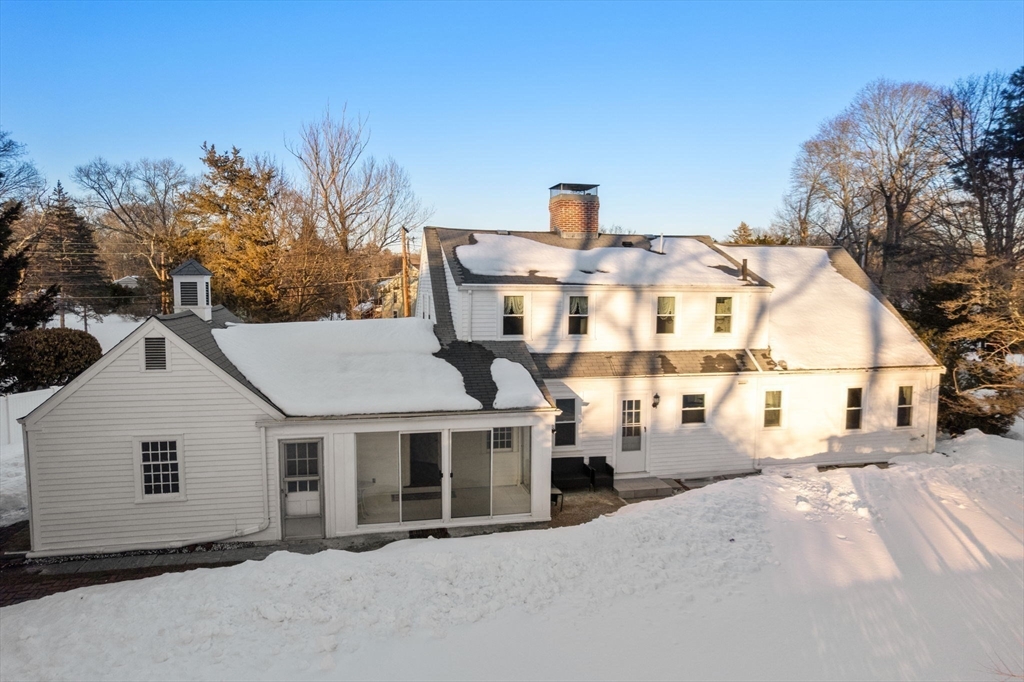 340 North Main Street Natick, MA 01760 - Photo 32 of 35 a front view of a house with a yard