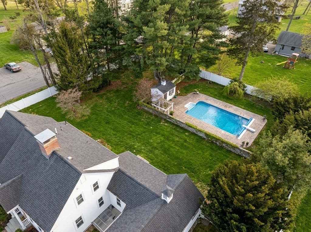 340 North Main Street Natick, MA 01760 - Photo 34 of 35 an aerial view of a house with a yard
