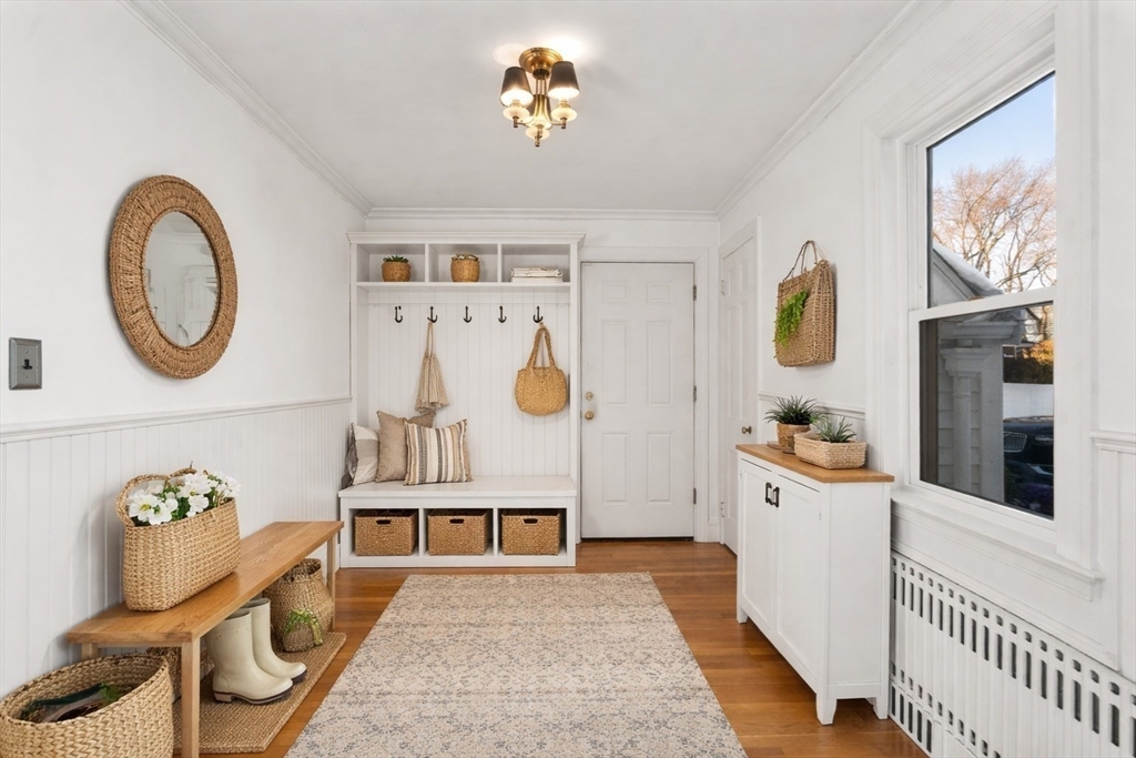 340 North Main Street Natick, MA 01760 - Photo 9 of 35 a living room with furniture and wooden floor