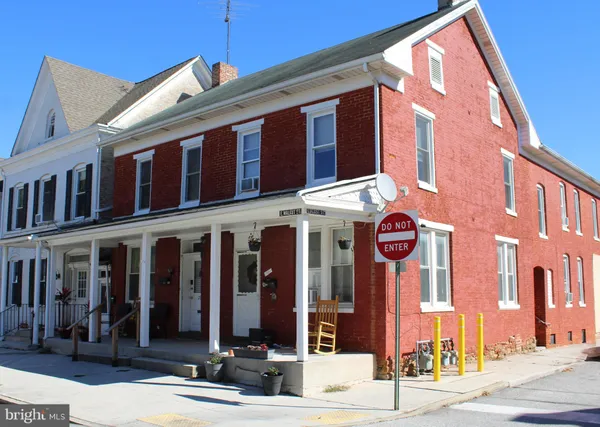 a front view of a building with street