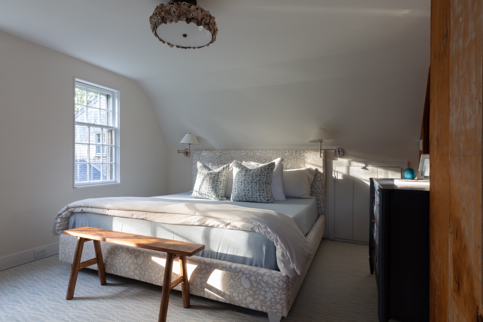 24 Milk Street Nantucket, MA 02554 - Photo 30 of 39 a bedroom with bed and a window