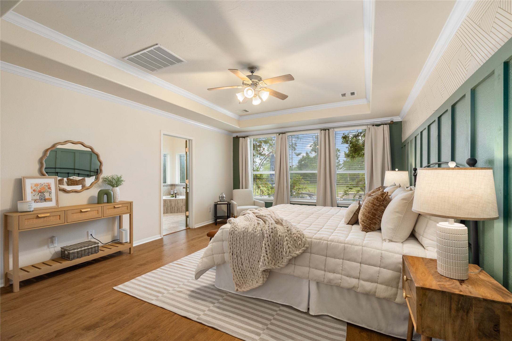 4502 Sunrise Road Baytown, TX 77523 - Photo 17 of 42 a bedroom with a bed and wooden floor