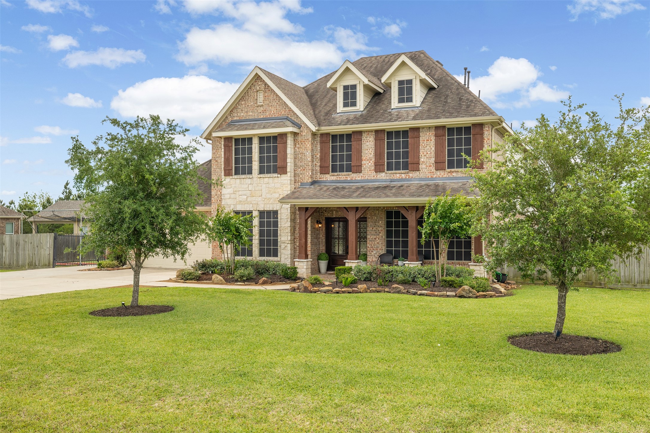 4502 Sunrise Road Baytown, TX 77523 - Photo 2 of 42 a front view of a house with a yard