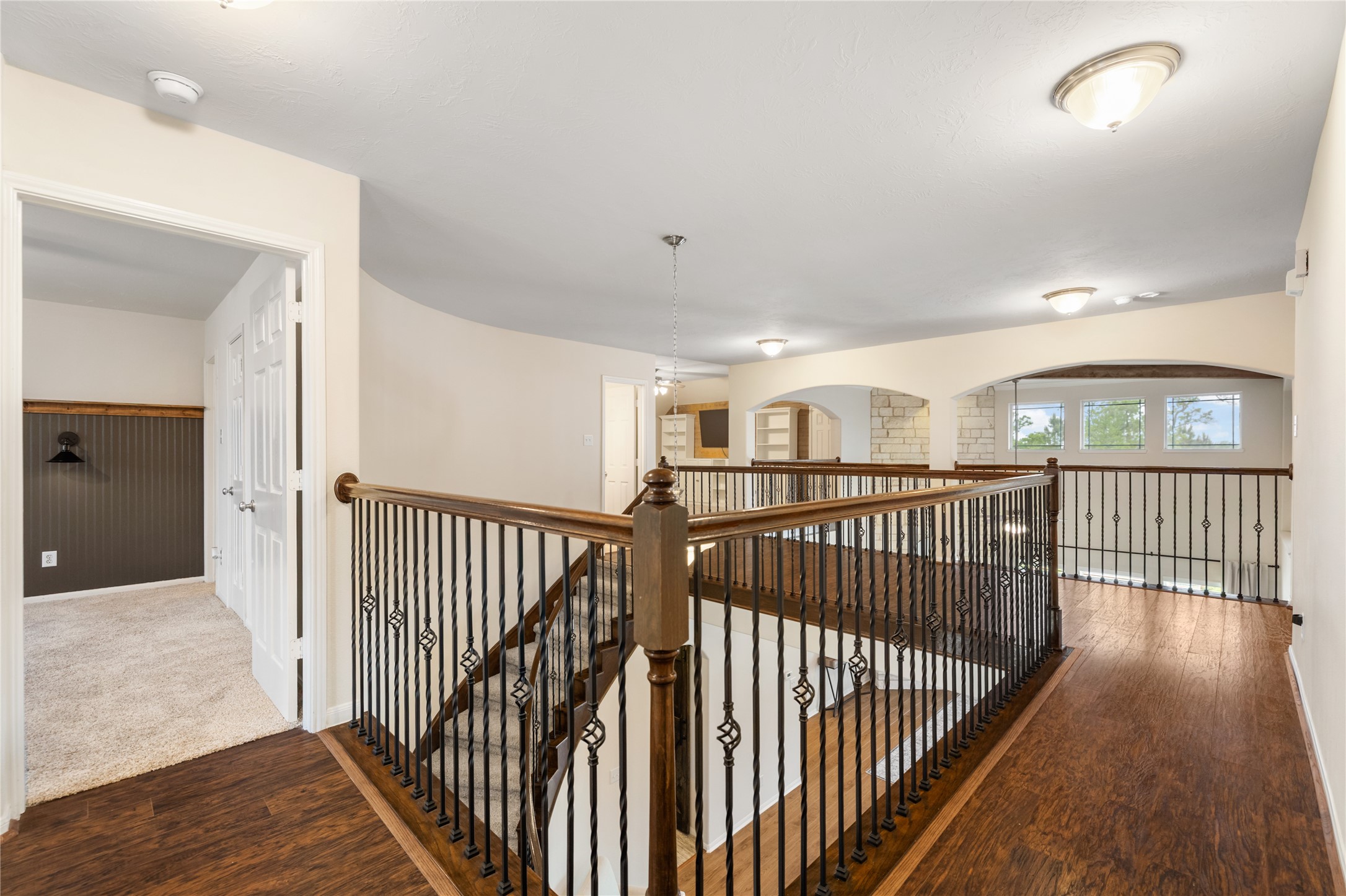 4502 Sunrise Road Baytown, TX 77523 - Photo 24 of 42 a view of a hallway with wooden floor