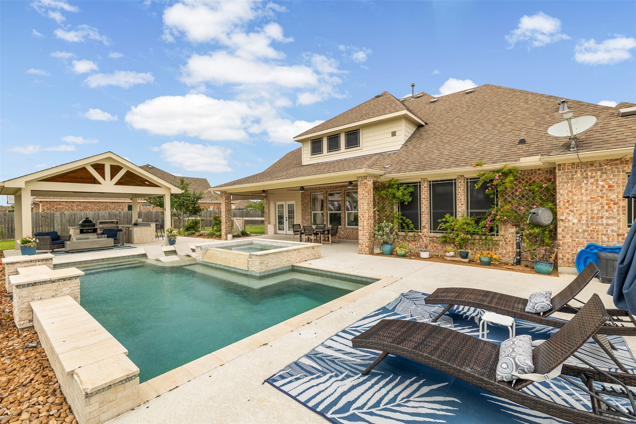 4502 Sunrise Road Baytown, TX 77523 - Photo 35 of 42 a view of house with swimming pool outdoor seating