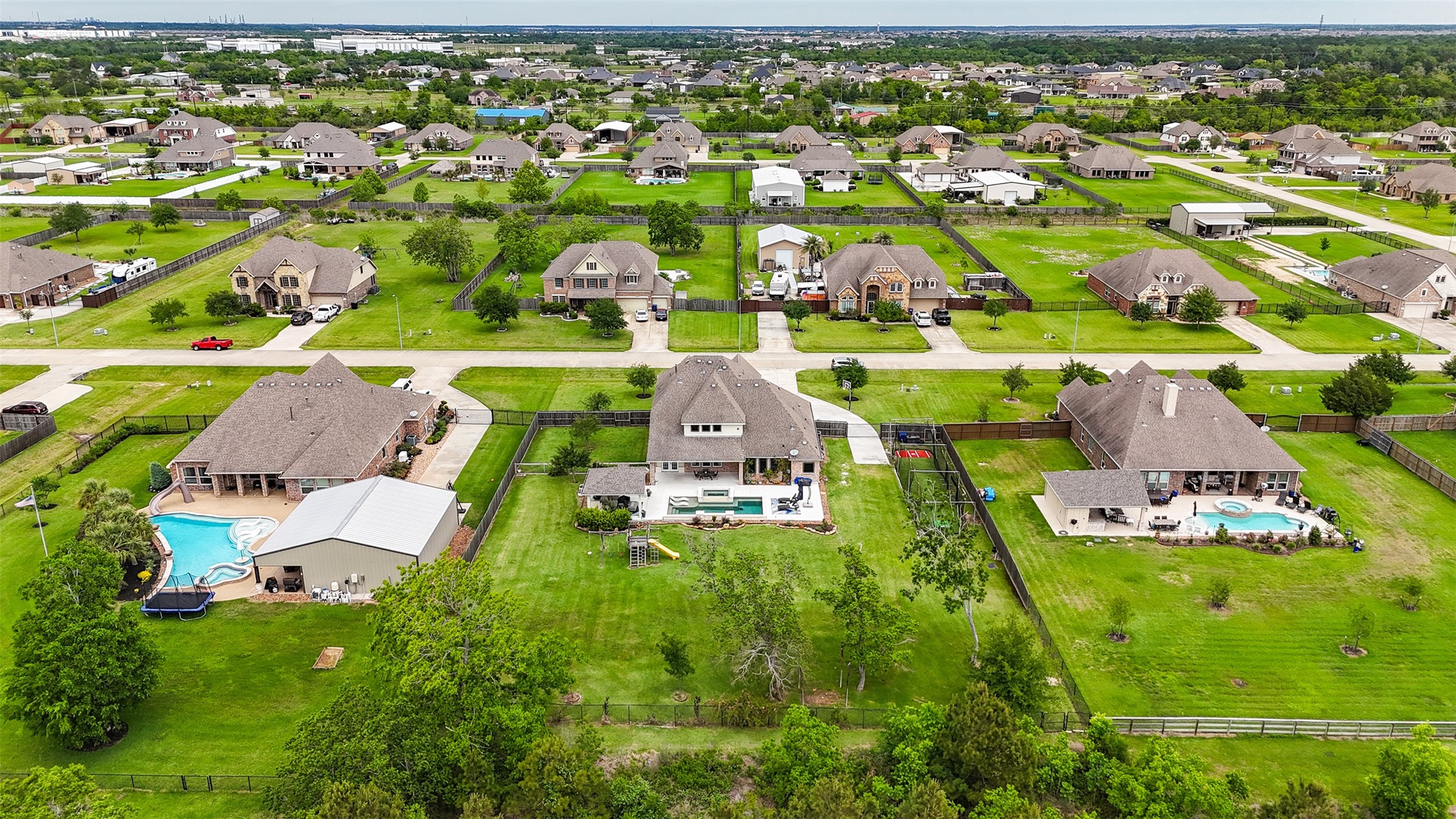 4502 Sunrise Road Baytown, TX 77523 - Photo 40 of 42 an aerial view of residential houses with outdoor space