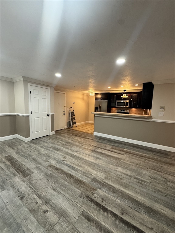 1619 Braley Road, Unit 98 New Bedford, MA 02745 - Photo 13 of 32 a view of empty room with wooden floor