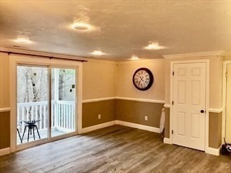 1619 Braley Road, Unit 98 New Bedford, MA 02745 - Photo 18 of 32 a view of a hallway with entryway