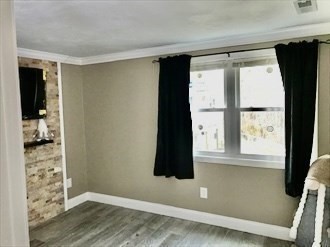 1619 Braley Road, Unit 98 New Bedford, MA 02745 - Photo 24 of 32 a view of walk in closet with clothes and shoes