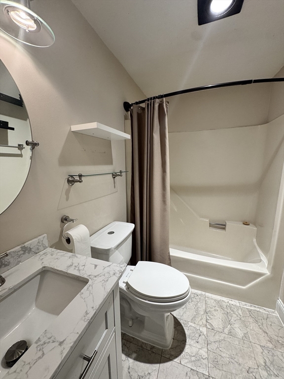1619 Braley Road, Unit 98 New Bedford, MA 02745 - Photo 30 of 32 a bathroom with a sink toilet and shower