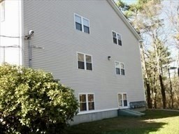 1619 Braley Road, Unit 98 New Bedford, MA 02745 - Photo 5 of 32 a view of backyard with a garden