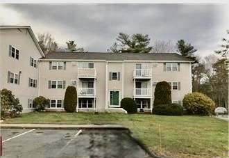 1619 Braley Road, Unit 98 New Bedford, MA 02745 - Photo 6 of 32 a view of a house with a yard and plants