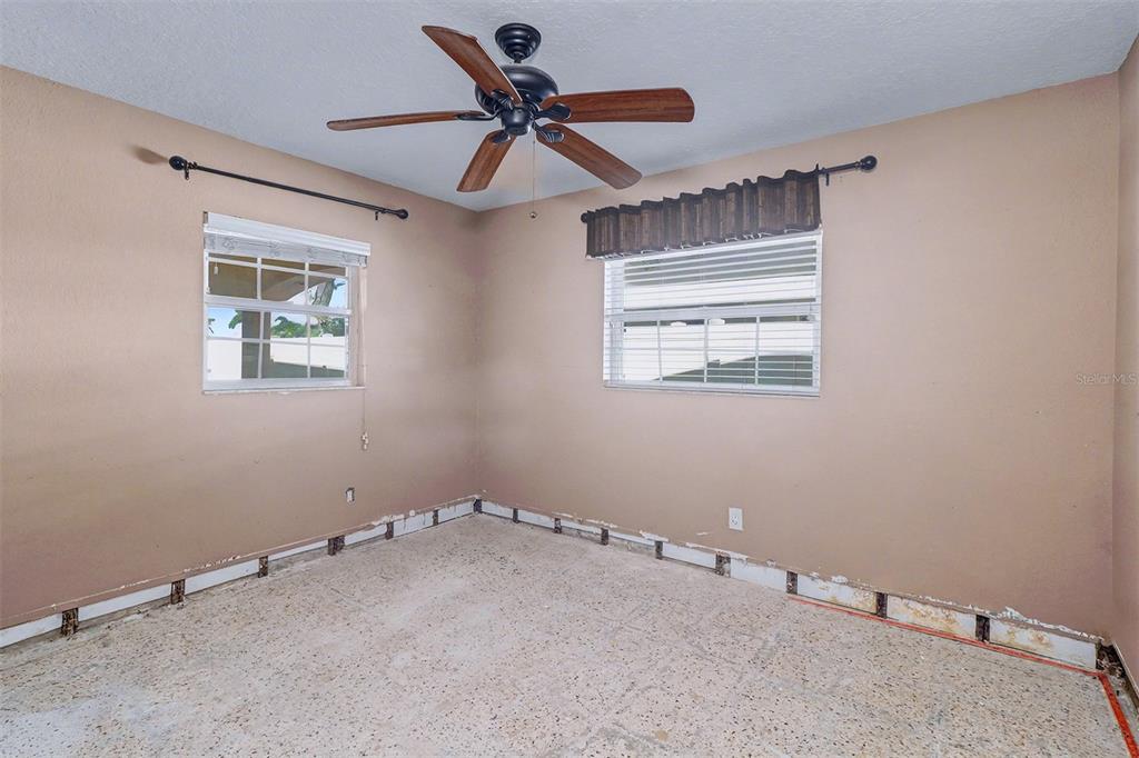 15918 Redington Drive Redington Beach, FL 33708 - Photo 18 of 33 a view of room with a ceiling fan