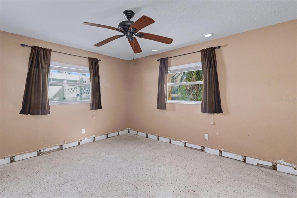 15918 Redington Drive Redington Beach, FL 33708 - Photo 19 of 33 a very nice looking room with a ceiling fan