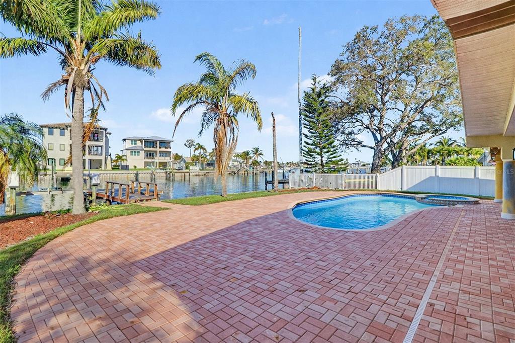 15918 Redington Drive Redington Beach, FL 33708 - Photo 24 of 33 a view of outdoor space yard and swimming pool