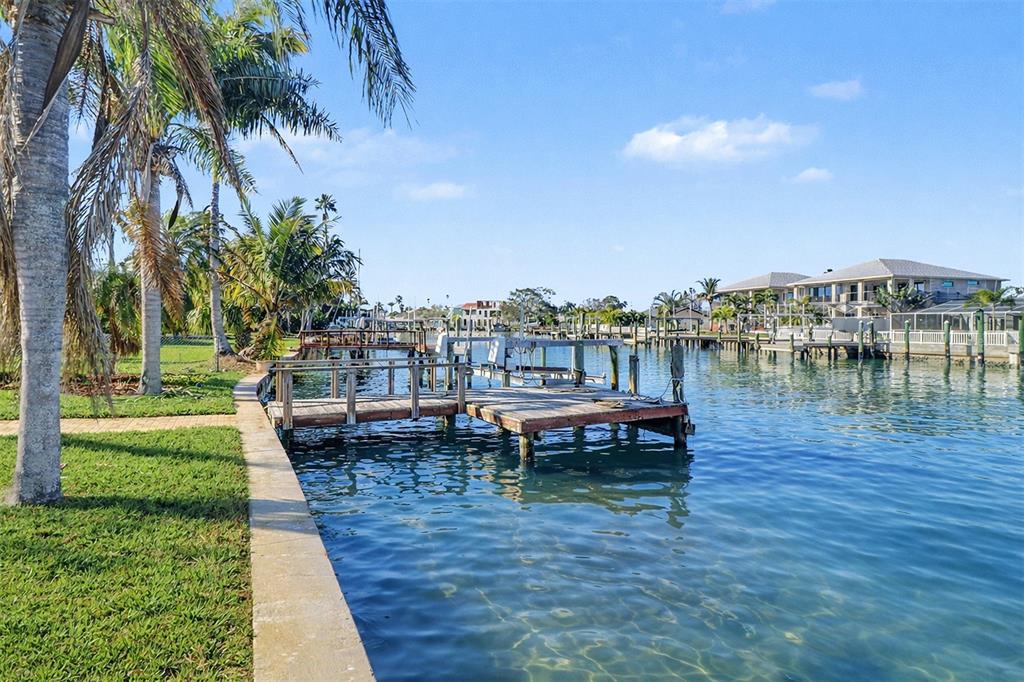 15918 Redington Drive Redington Beach, FL 33708 - Photo 28 of 33 a view of a lake with a yard