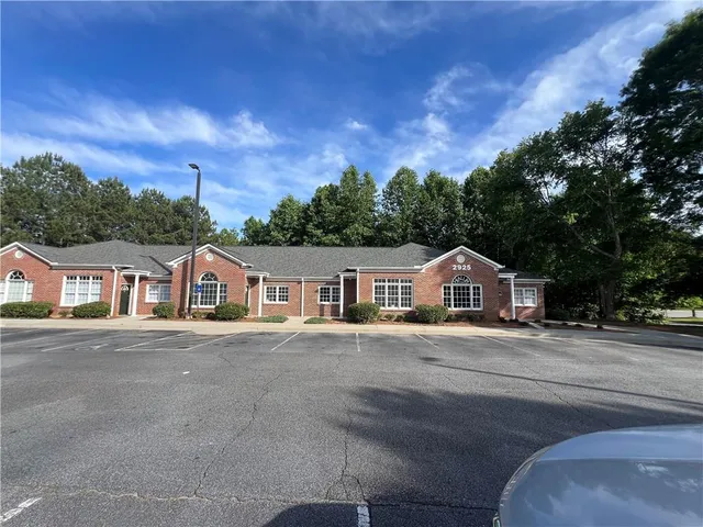 front view of a house with a street